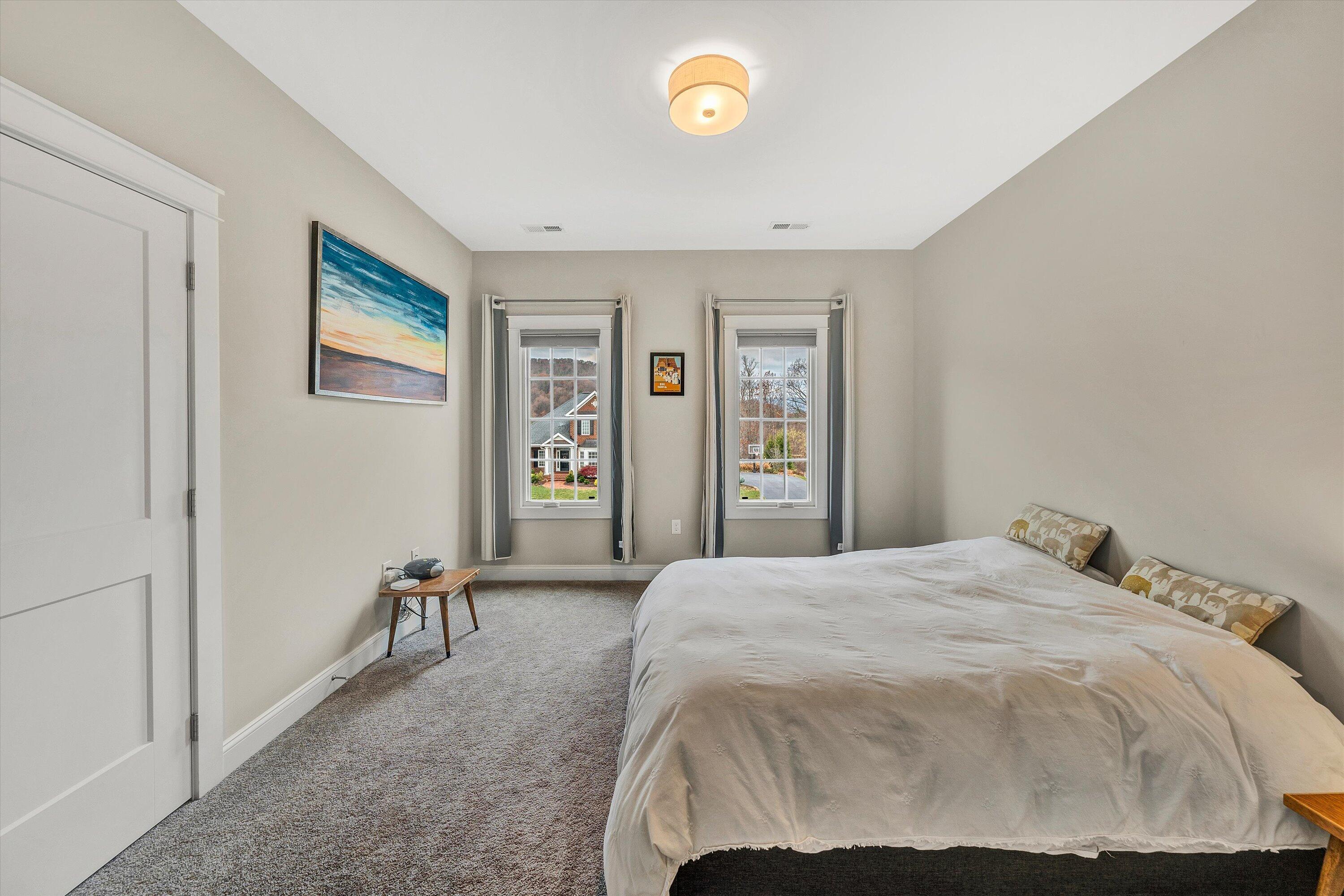 6901 Fairway Ridge Road Salem, VA 24153 - Photo 31 of 58 a bedroom with a bed and a table