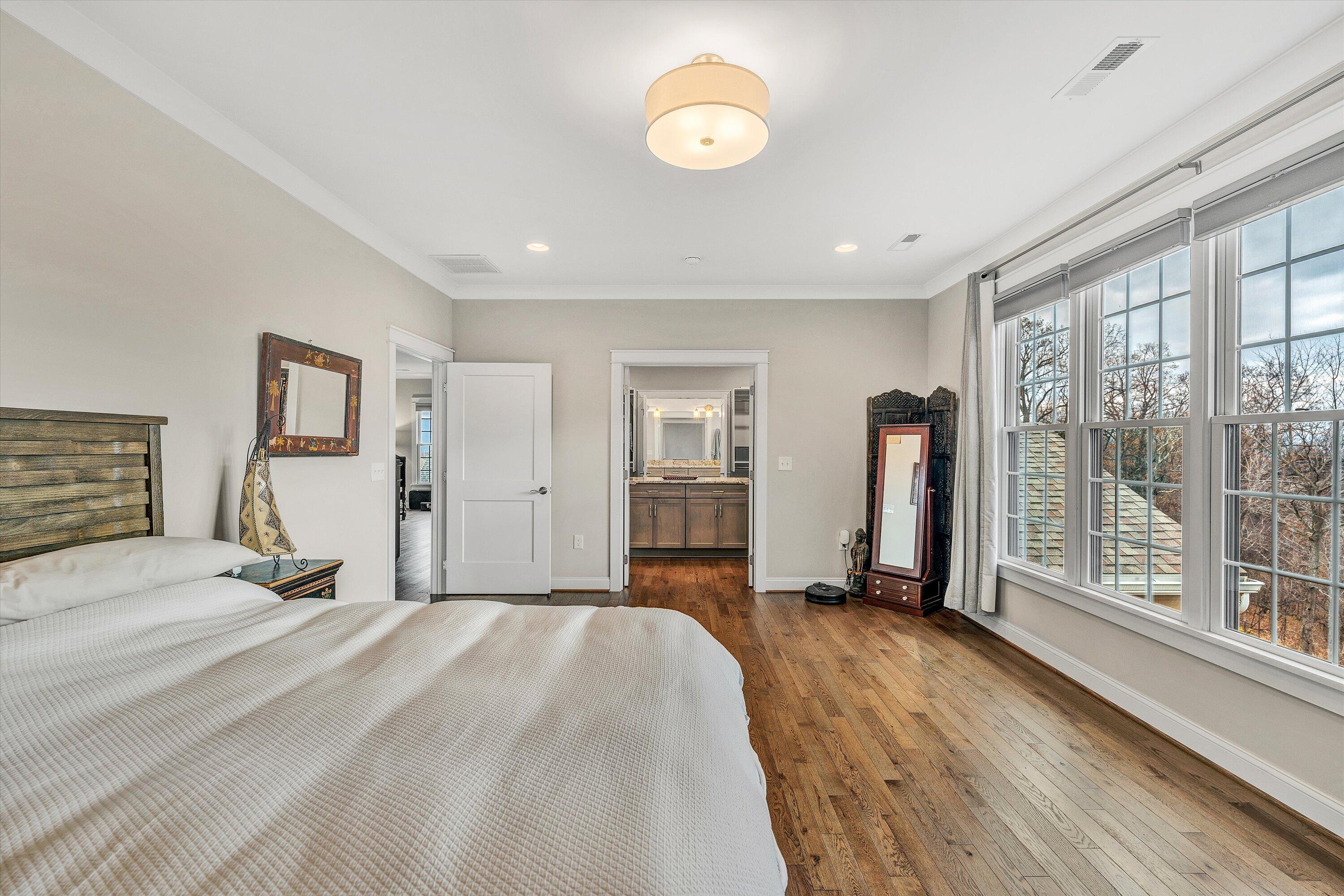 6901 Fairway Ridge Road Salem, VA 24153 - Photo 33 of 58 a view of a bedroom with furniture and large windows