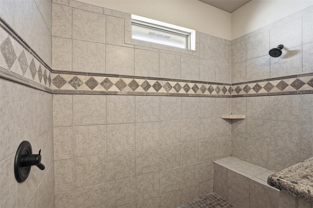 842 County Road 4371 Decatur, TX 76234 - Photo 13 of 35 a bathroom with a shower