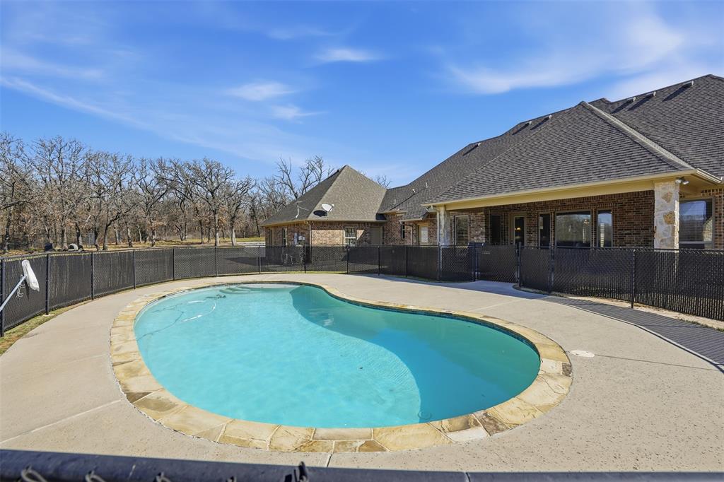 842 County Road 4371 Decatur, TX 76234 - Photo 27 of 35 a view of a house with swimming pool