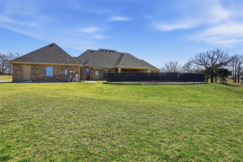 842 County Road 4371 Decatur, TX 76234 - Photo 28 of 35 a front view of a house with a yard