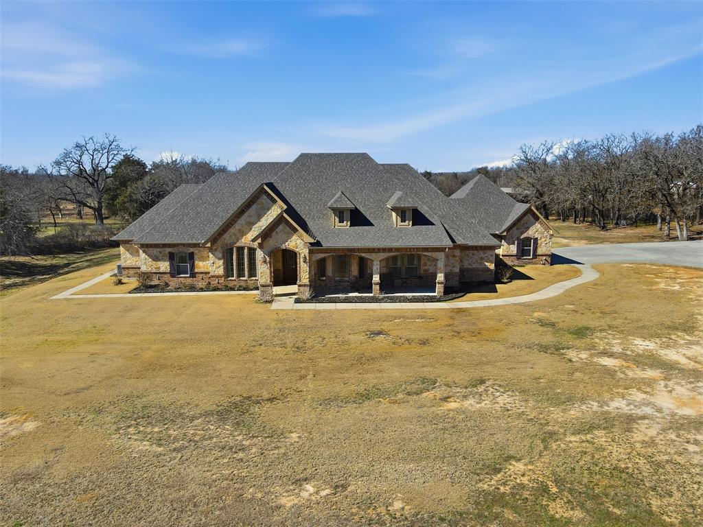 842 County Road 4371 Decatur, TX 76234 - Photo 31 of 35 a front view of a house with a yard