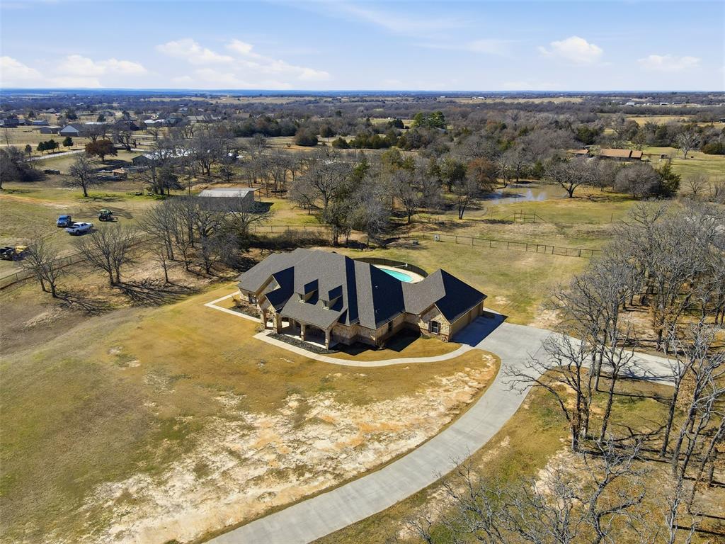 842 County Road 4371 Decatur, TX 76234 - Photo 33 of 35 an aerial view of residential houses with outdoor space