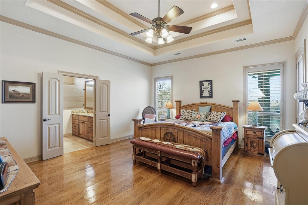 842 County Road 4371 Decatur, TX 76234 - Photo 4 of 35 a bedroom with a bed furniture and a window