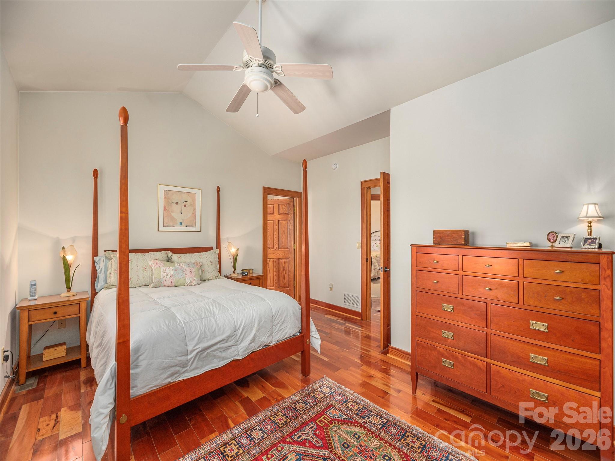 68 Crestwood Road Asheville, NC 28804 - Photo 18 of 37 a bedroom with a bed and a dresser