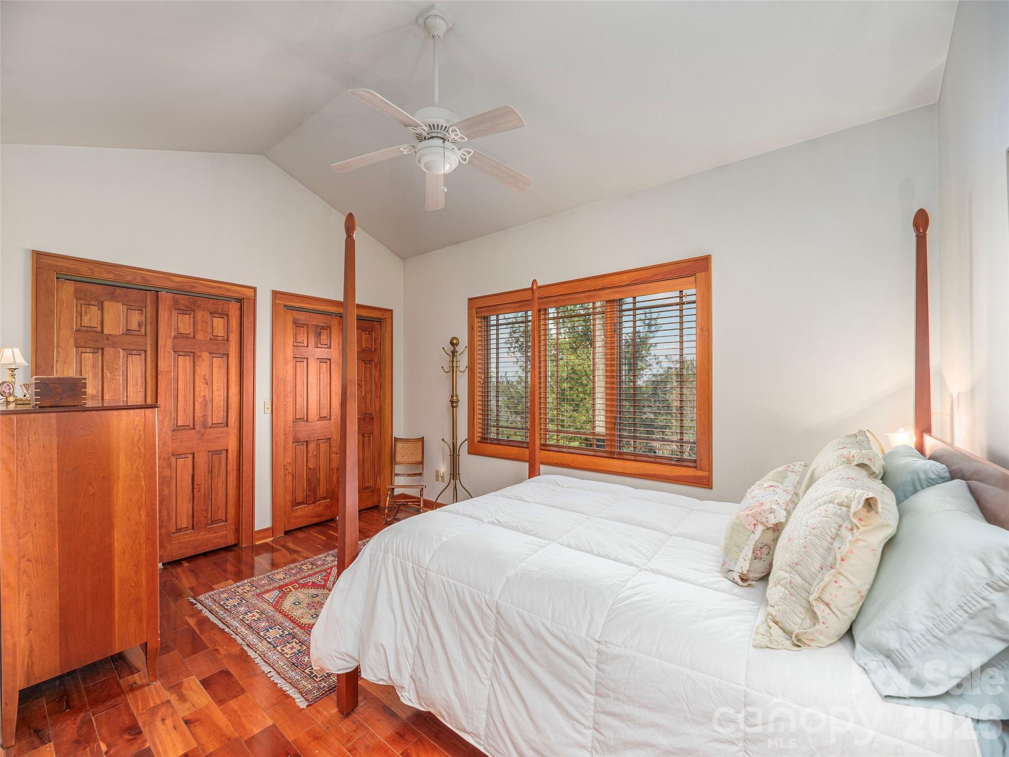 68 Crestwood Road Asheville, NC 28804 - Photo 19 of 37 a bedroom with a large bed and a window