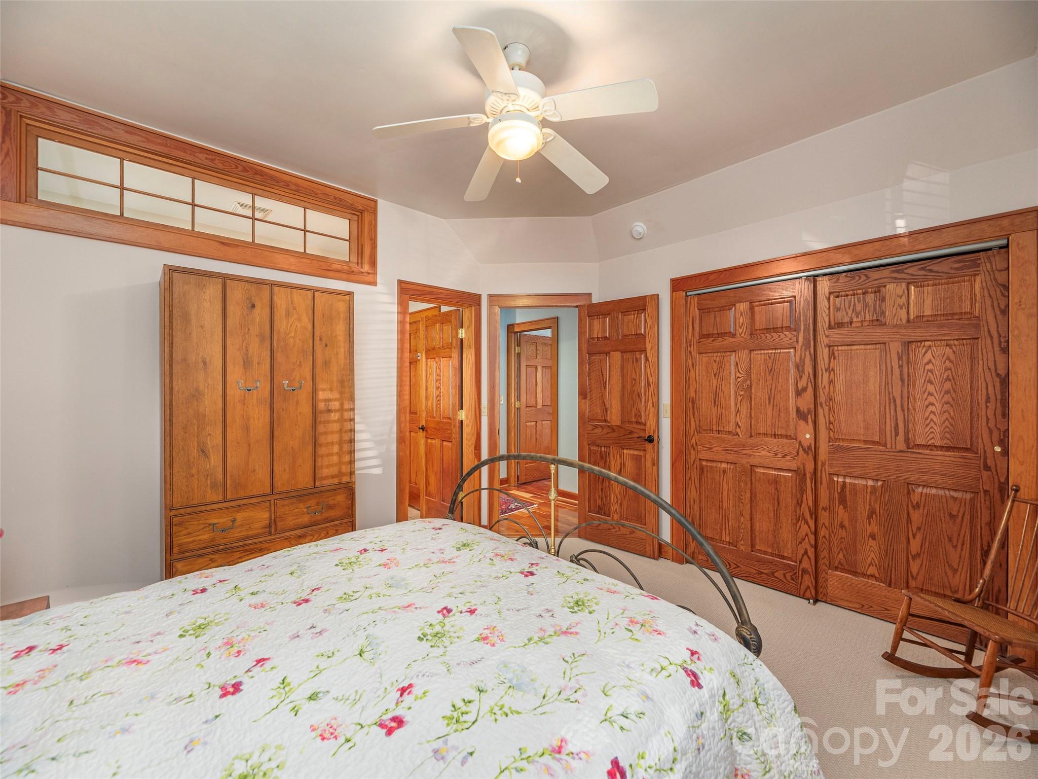 68 Crestwood Road Asheville, NC 28804 - Photo 23 of 37 a bedroom with a bed and a dresser