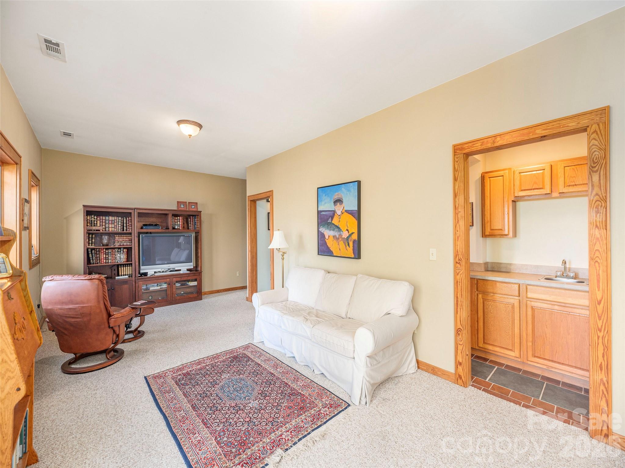 68 Crestwood Road Asheville, NC 28804 - Photo 25 of 37 a living room with furniture and a couch
