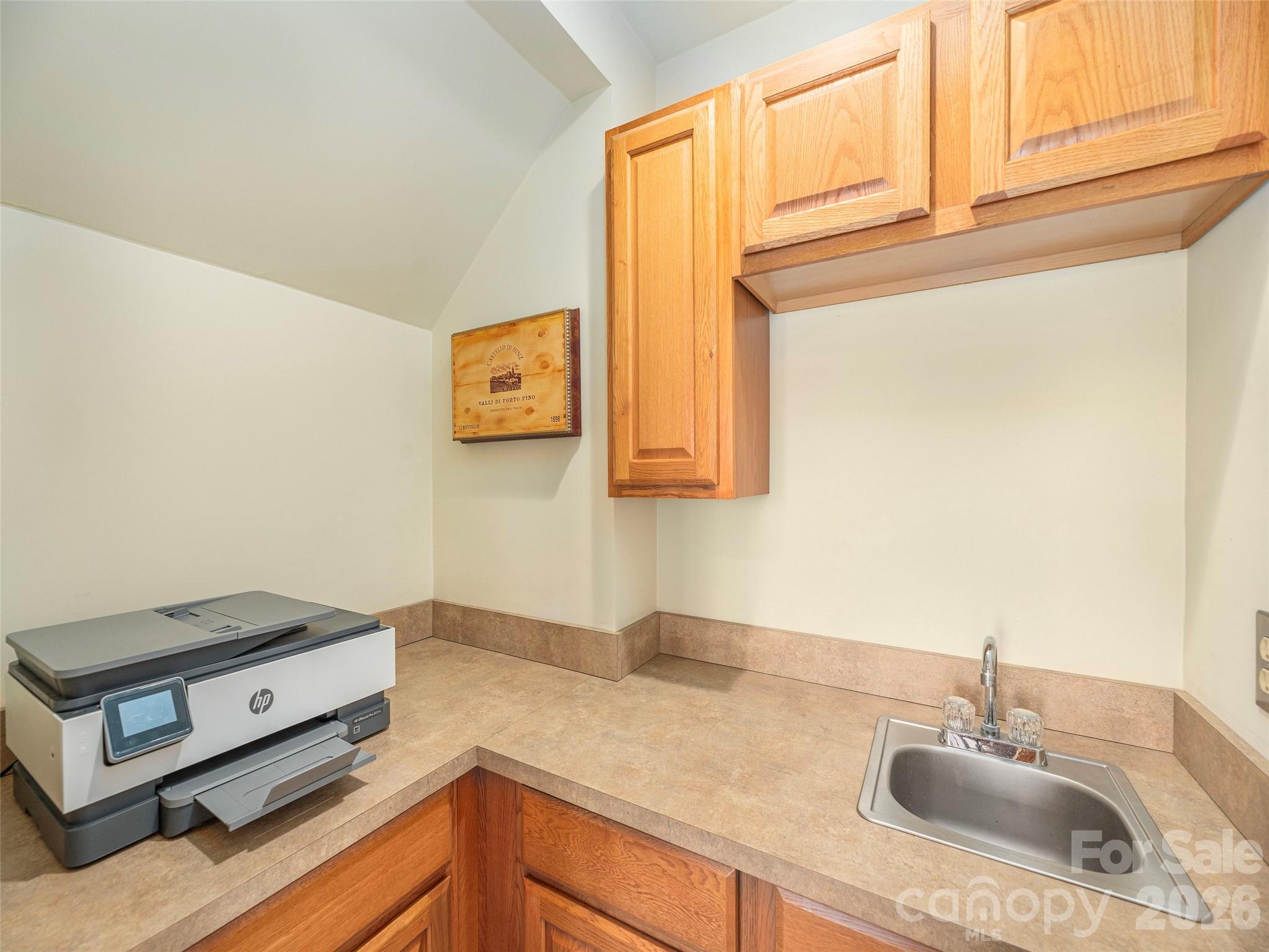 68 Crestwood Road Asheville, NC 28804 - Photo 27 of 37 a kitchen with a sink cabinets and a wooden floor