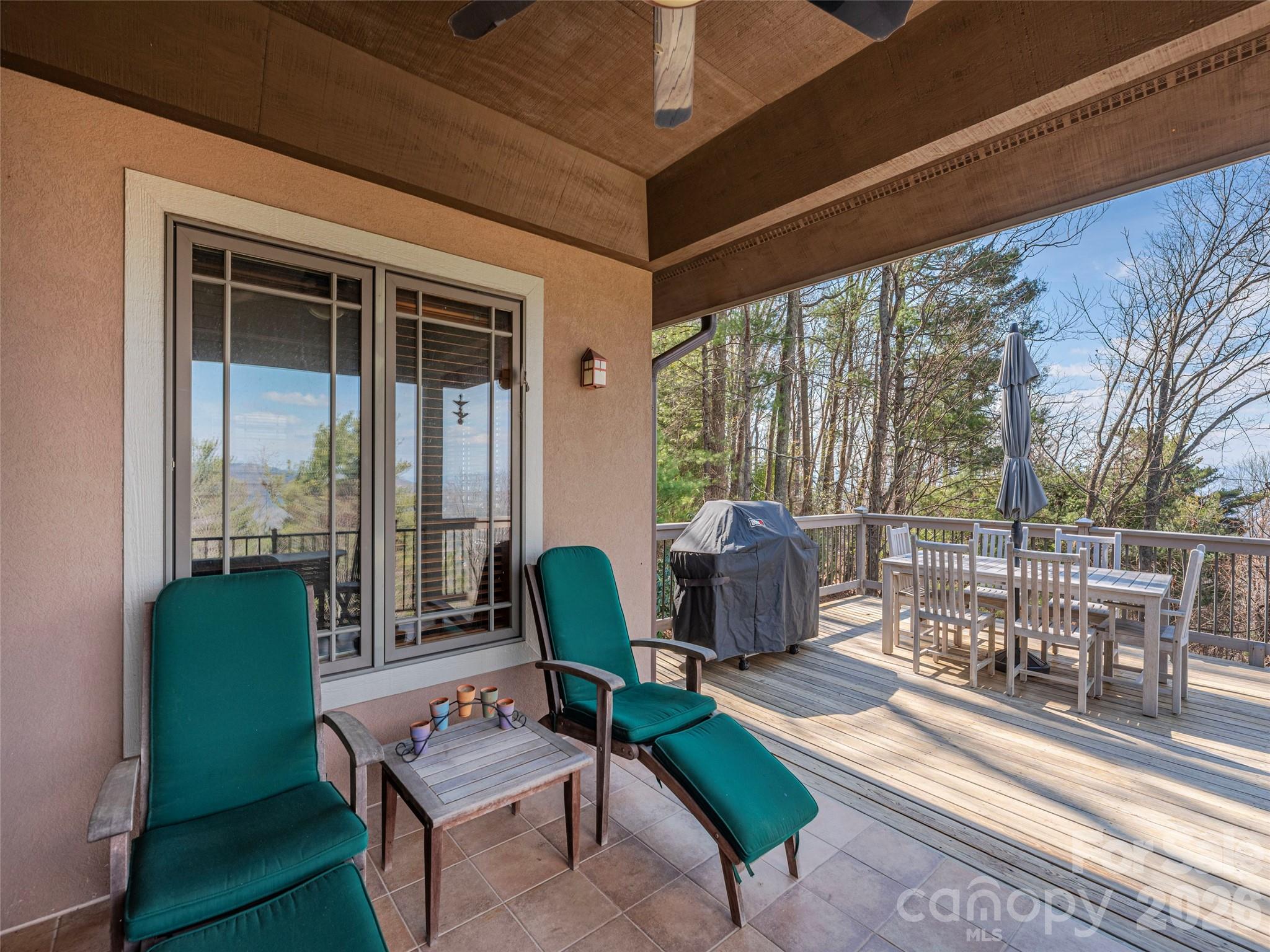 68 Crestwood Road Asheville, NC 28804 - Photo 8 of 37 a living room with furniture and a floor to ceiling window