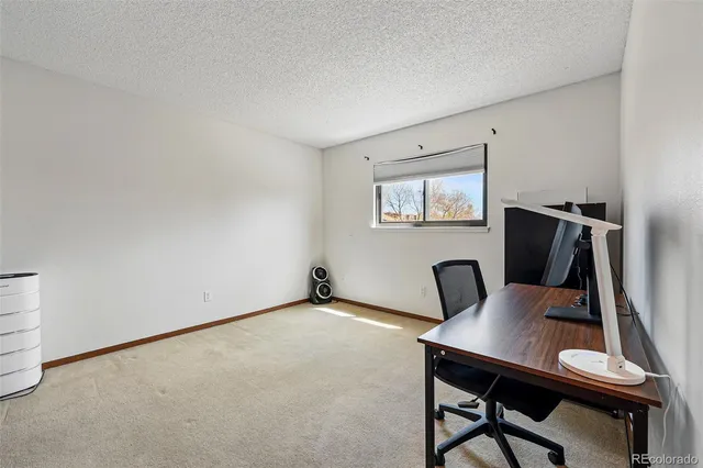 a workspace with furniture and a couch