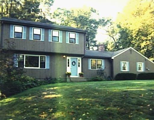 80 Autumn Ridge Road Shelton, CT 06484 - Photo 1 of 1 a front view of a house with garden