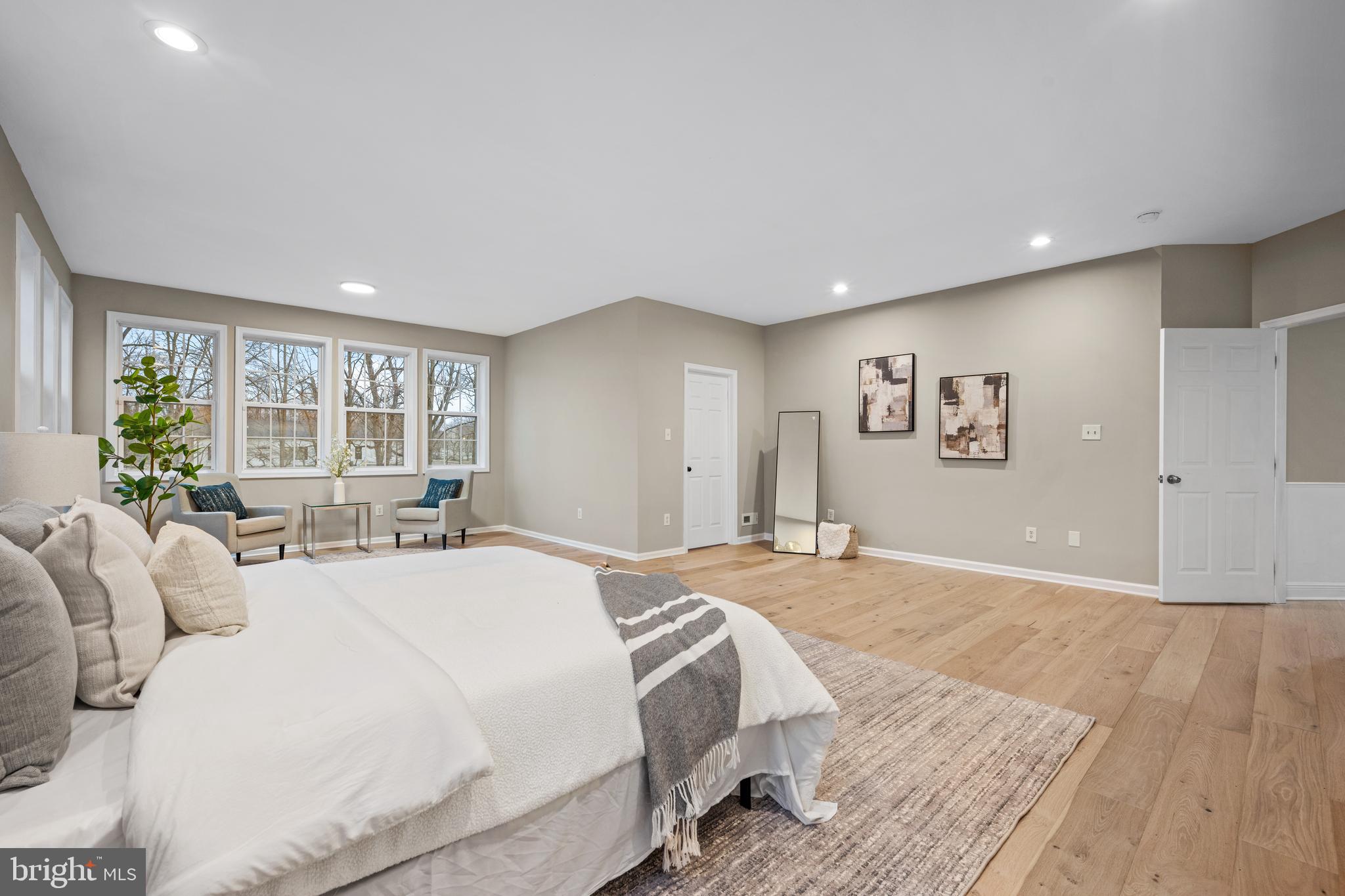 6 River Run Lawnside, NJ 08045 - Photo 20 of 64 a spacious bedroom with a large bed and a large window
