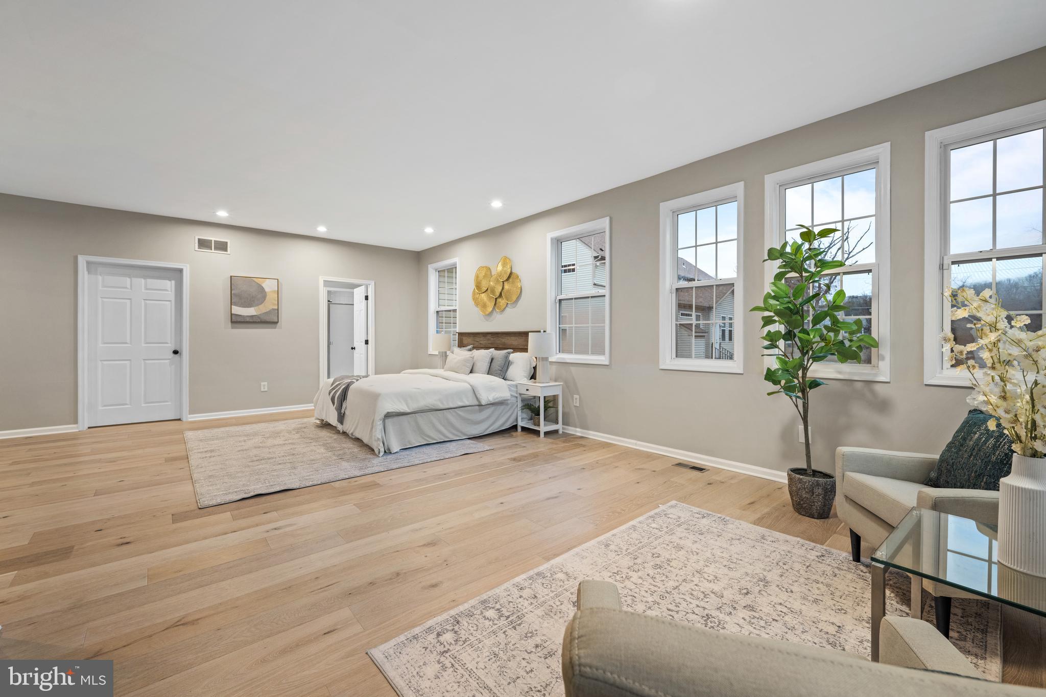 6 River Run Lawnside, NJ 08045 - Photo 22 of 64 a spacious bedroom with a large bed and windows