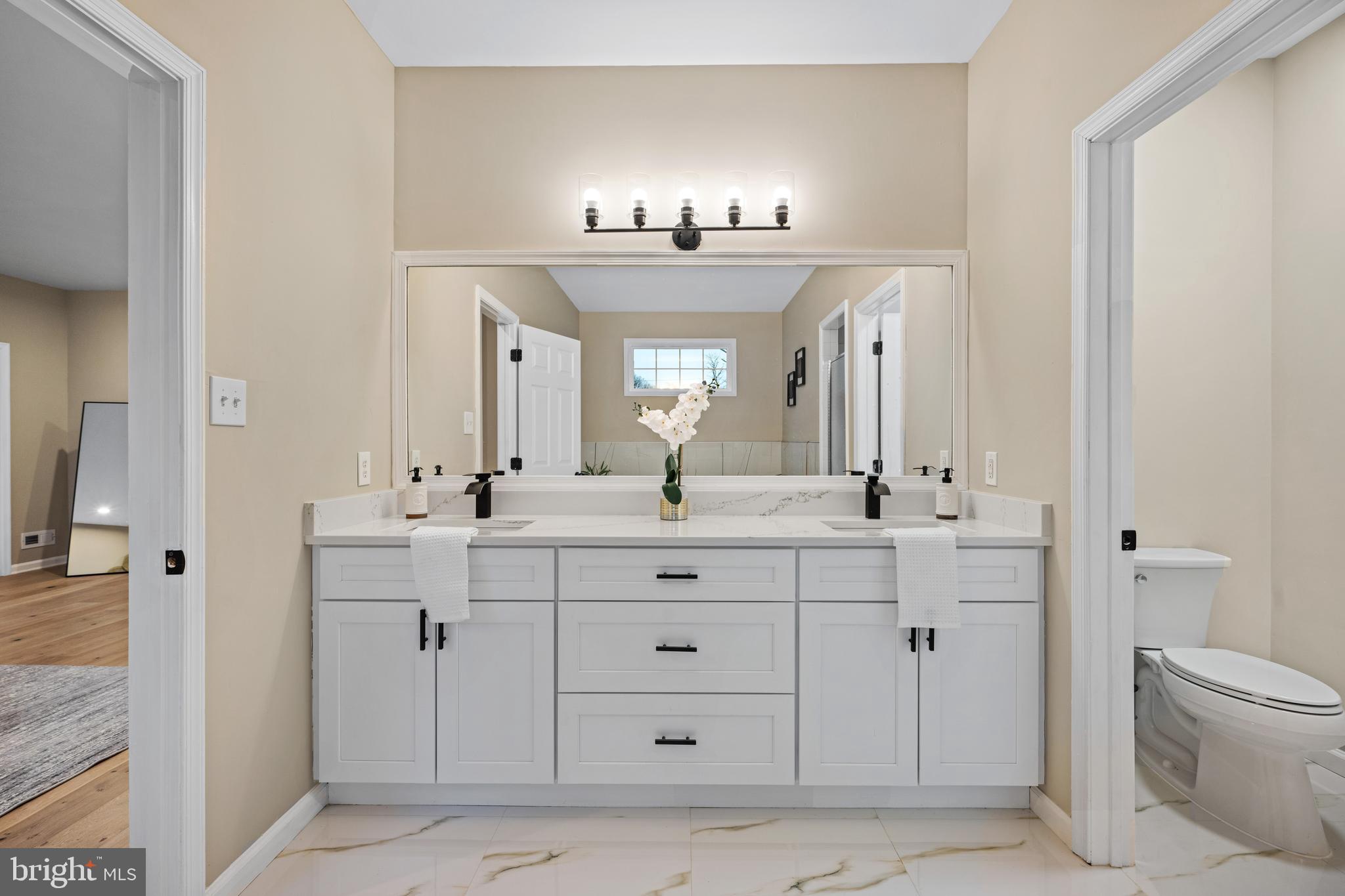 6 River Run Lawnside, NJ 08045 - Photo 23 of 64 a bathroom with a double vanity sink and a mirror