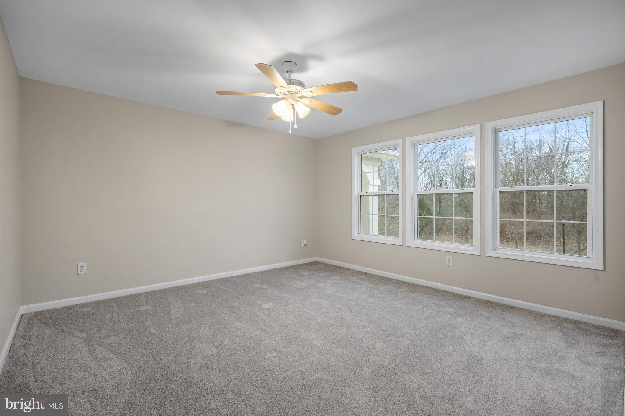 6 River Run Lawnside, NJ 08045 - Photo 30 of 64 an empty room with windows and fan