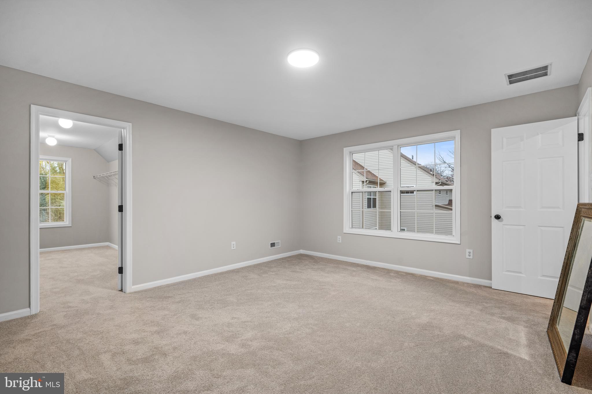 6 River Run Lawnside, NJ 08045 - Photo 42 of 64 an empty room with a empty space and windows