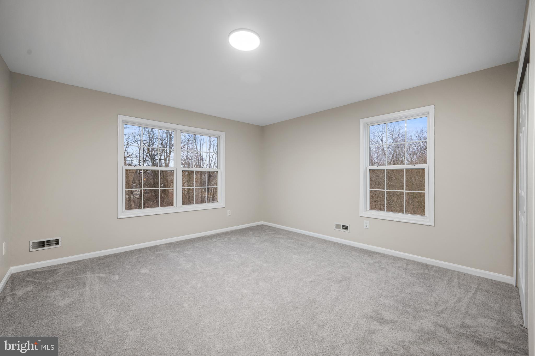 6 River Run Lawnside, NJ 08045 - Photo 47 of 64 an empty room with a window