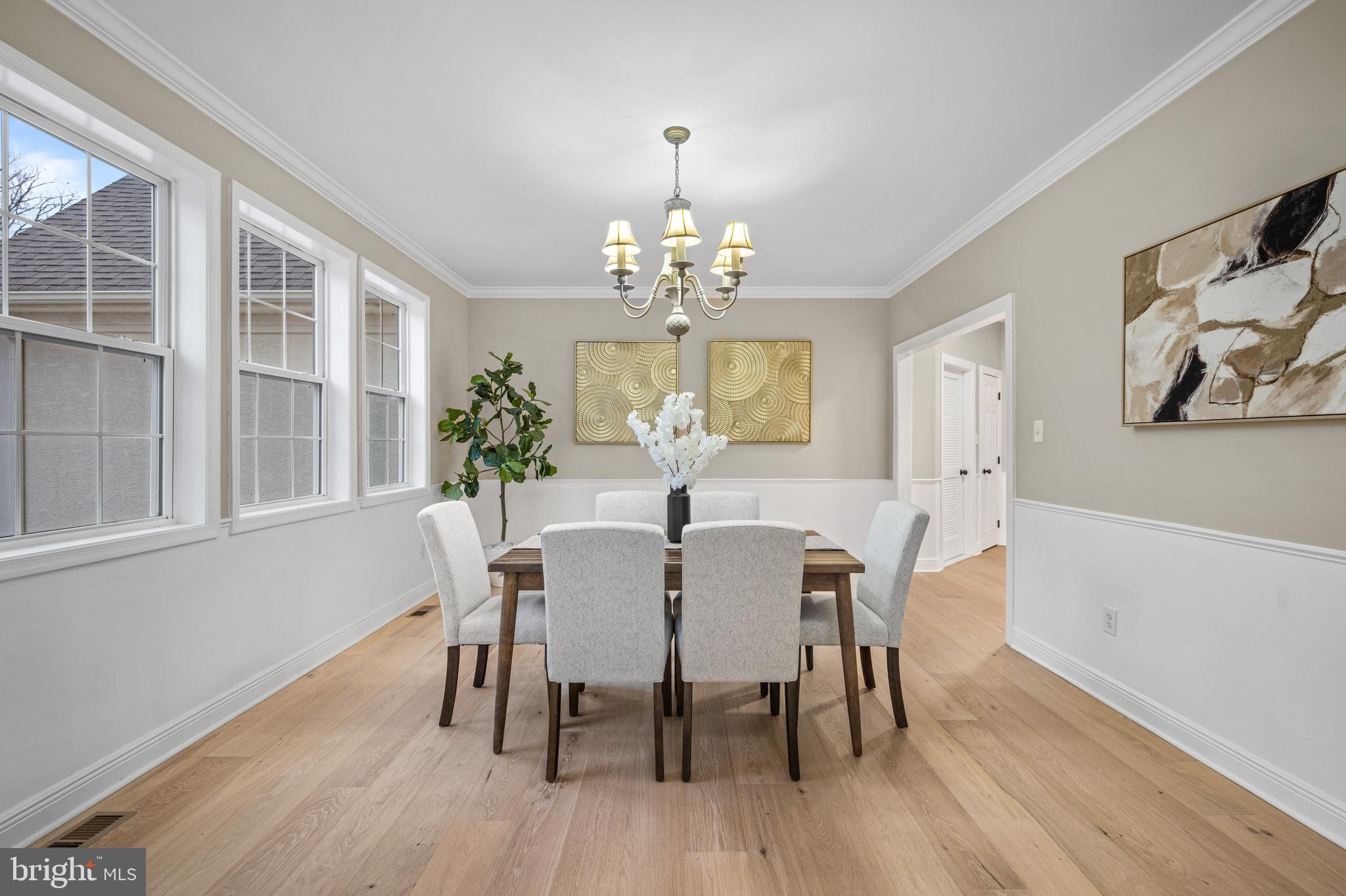 6 River Run Lawnside, NJ 08045 - Photo 6 of 64 a view of a dining room with furniture a chandelier and wooden floor