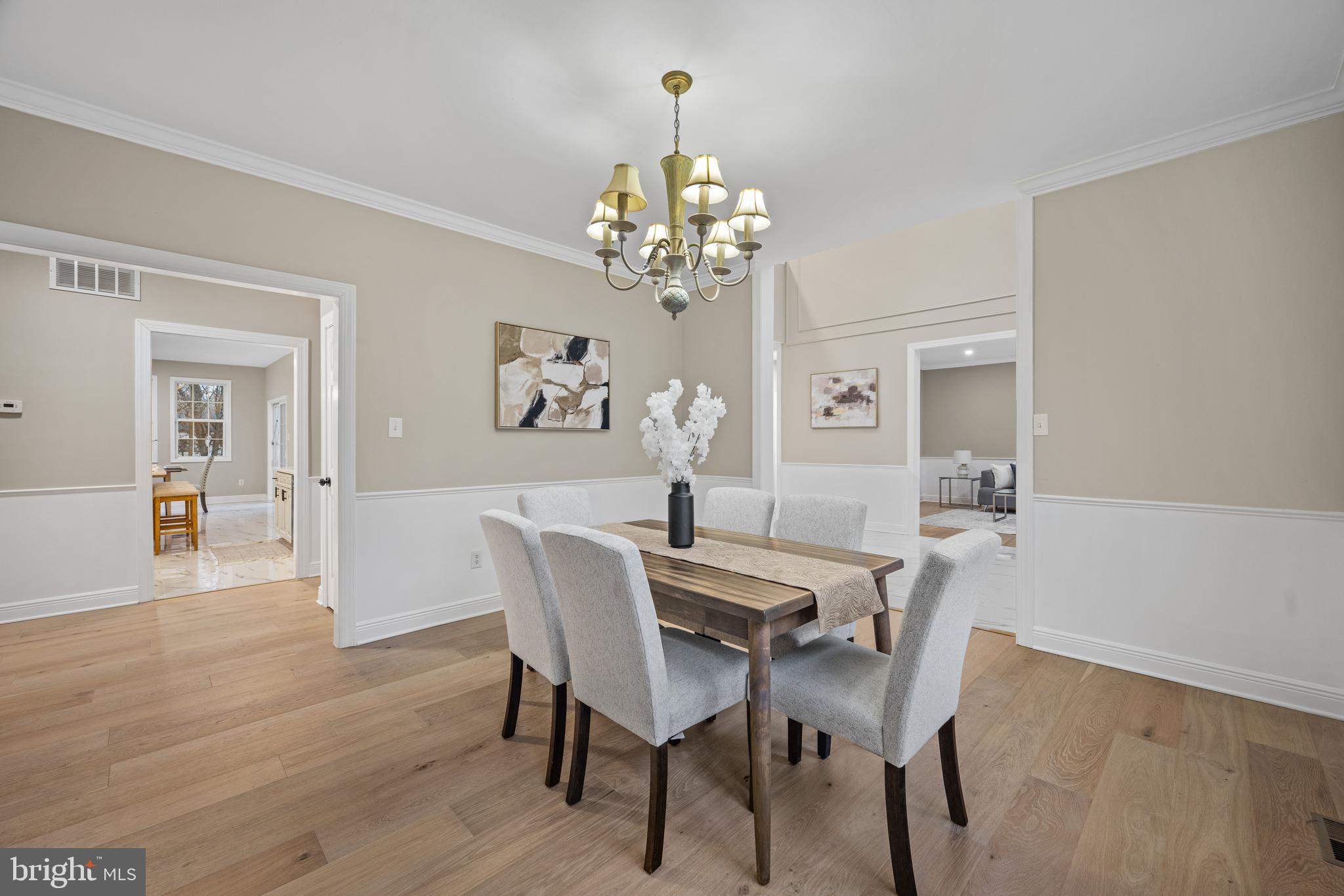 6 River Run Lawnside, NJ 08045 - Photo 7 of 64 a view of a dining room with furniture a chandelier and wooden floor