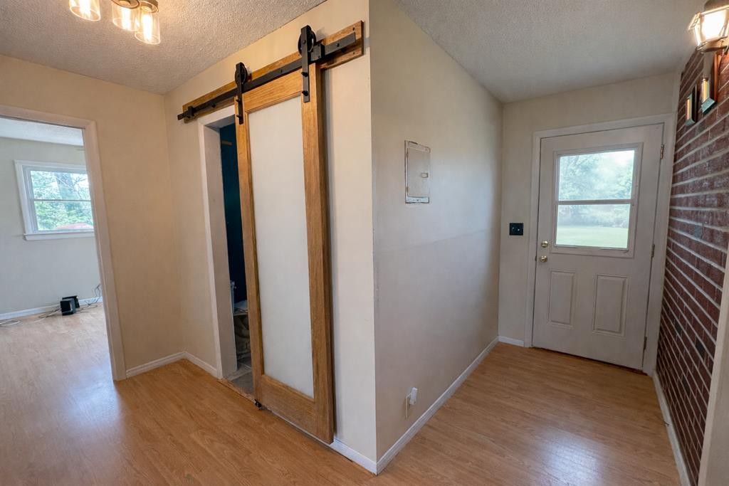 2633 Spencer Road Rock Island, TN 38581 - Photo 12 of 37 a view of a hallway with wooden floor and a window