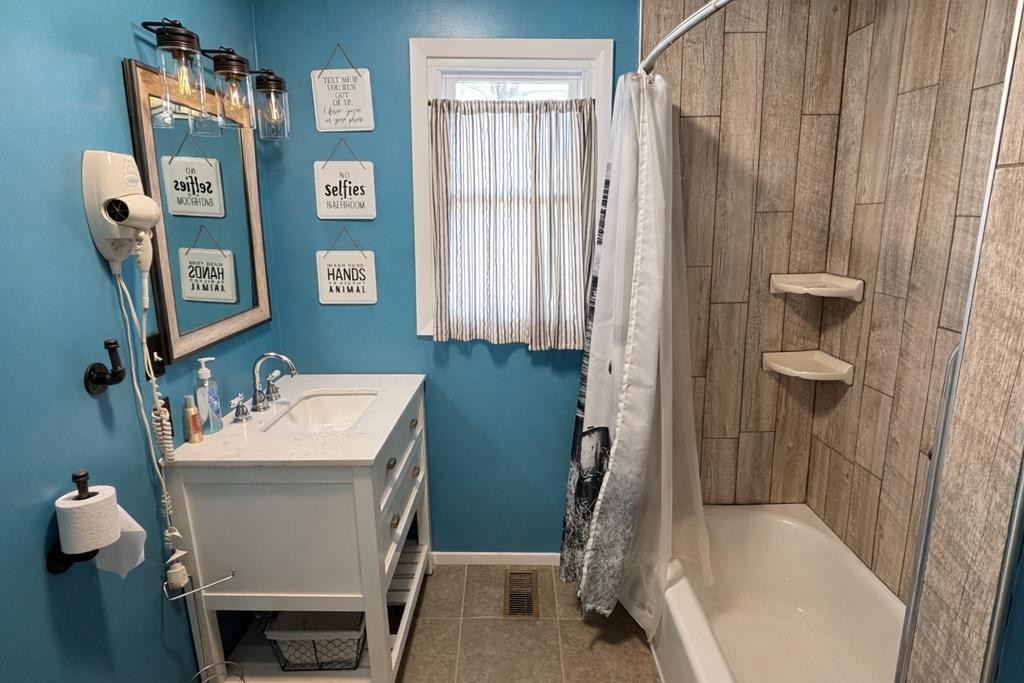 2633 Spencer Road Rock Island, TN 38581 - Photo 15 of 37 a bathroom with a sink toilet and shower