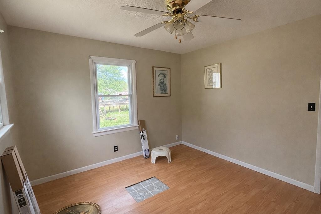 2633 Spencer Road Rock Island, TN 38581 - Photo 17 of 37 a room with a window and a ceiling fan