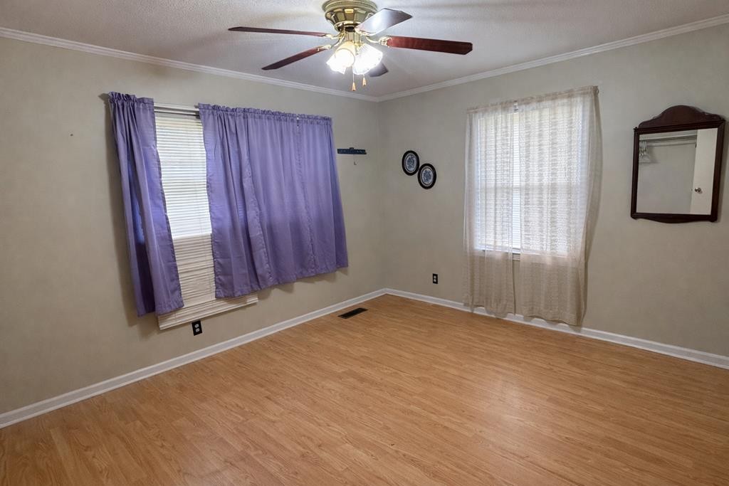 2633 Spencer Road Rock Island, TN 38581 - Photo 24 of 37 wooden floor in an empty room with a window