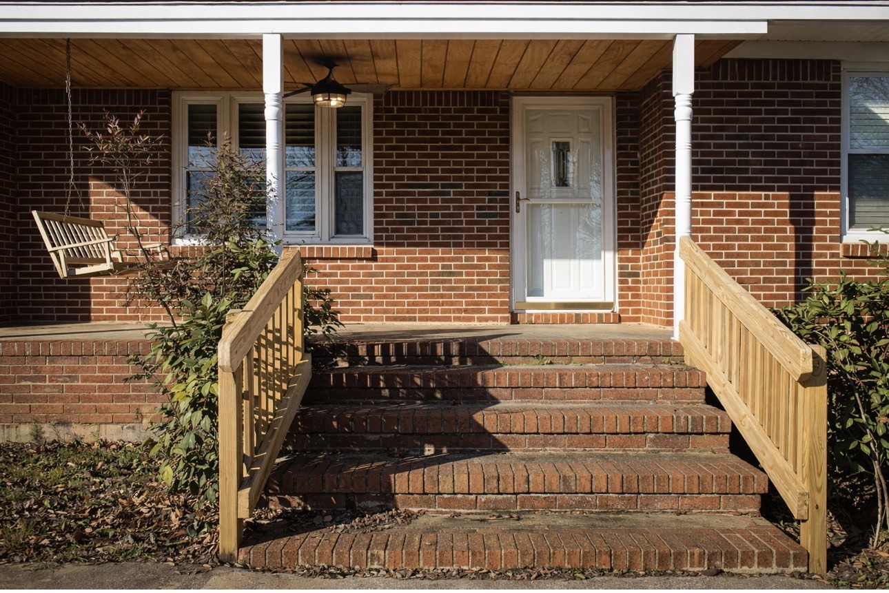 2633 Spencer Road Rock Island, TN 38581 - Photo 3 of 37 a front view of a house with a yard