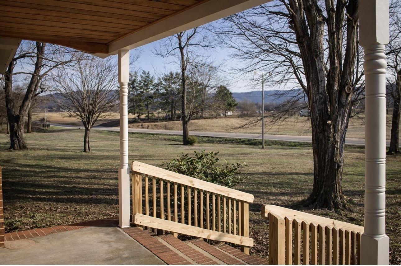 2633 Spencer Road Rock Island, TN 38581 - Photo 4 of 37 a view of a wooden deck next to a yard