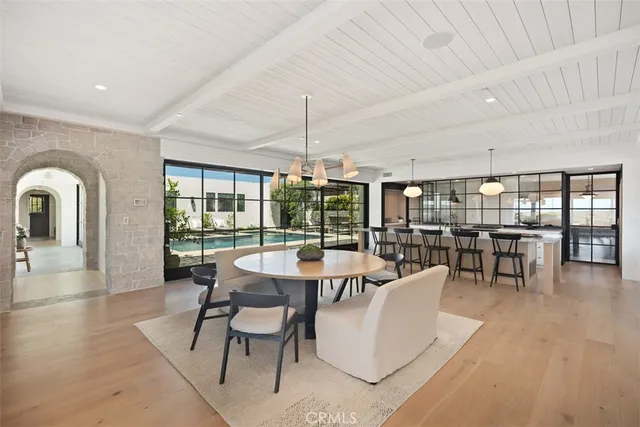 a bathroom with a bathtub and potted plant