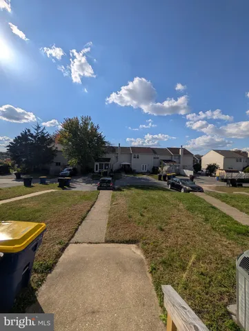 a view of yard with swimming pool outdoor seating yard and barbeque oven