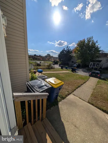 a view of a balcony with swimming pool