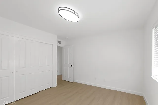 a view of a room with rack on the wall