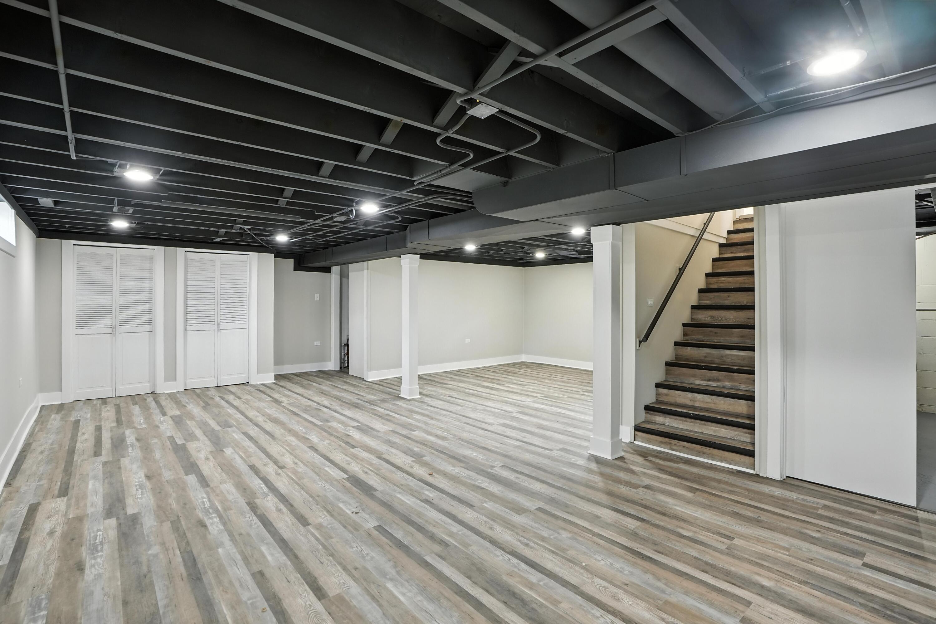 3312 East 170th Street Lansing, IL 60438 - Photo 15 of 38 a view of an empty room with wooden floor