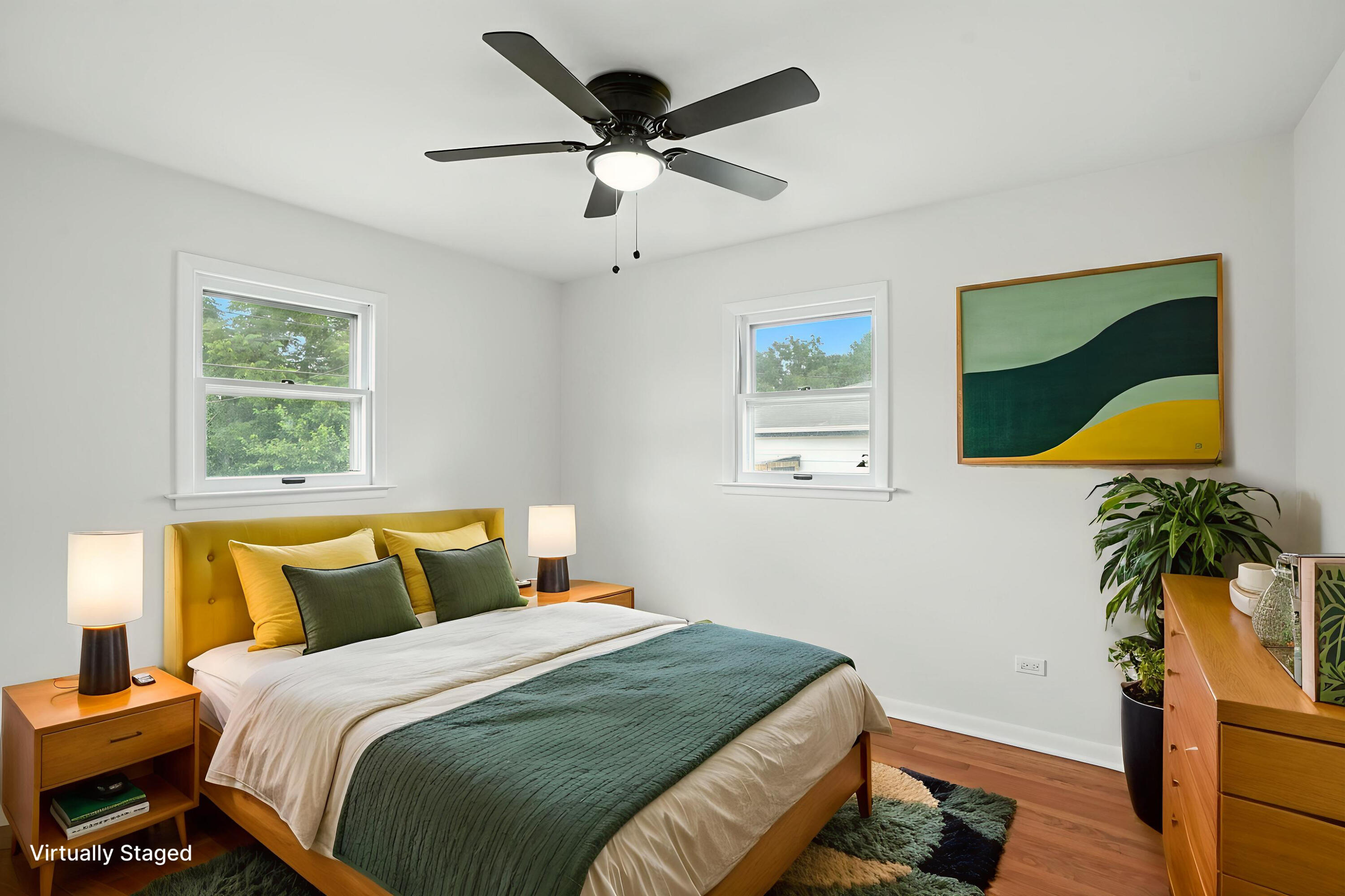 3312 East 170th Street Lansing, IL 60438 - Photo 25 of 38 a bedroom with a bed and a potted plant