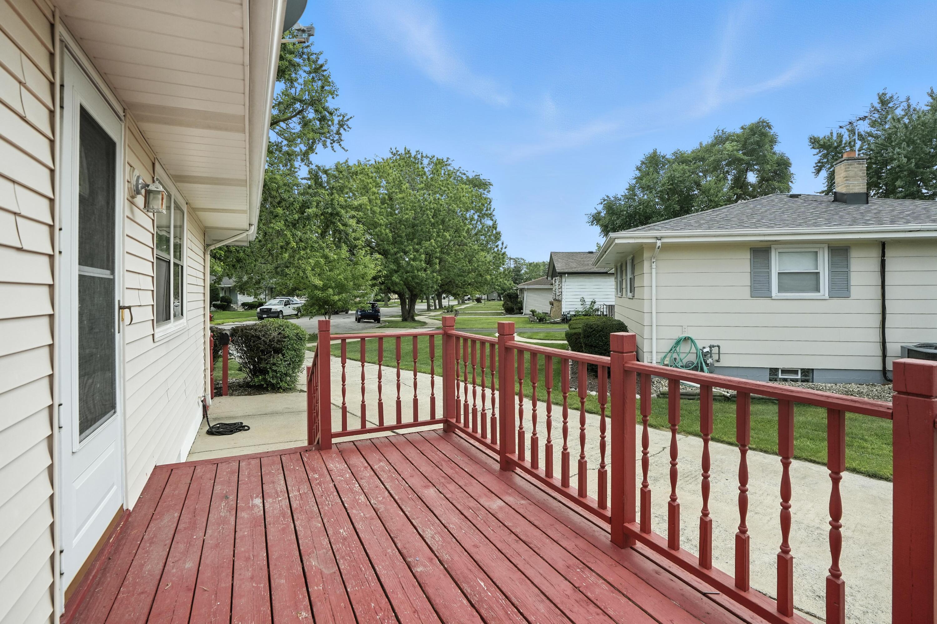 3312 East 170th Street Lansing, IL 60438 - Photo 27 of 38 a view of a wooden deck and a yard