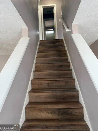 a fireplace with a wooden floor