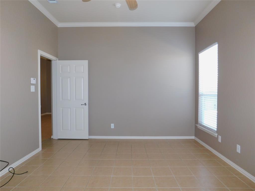 3919 Canton Court Denton, TX 76208 - Photo 12 of 26 a view of an empty room with a window