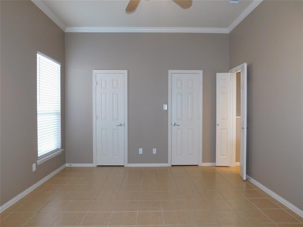 3919 Canton Court Denton, TX 76208 - Photo 13 of 26 an empty room with windows