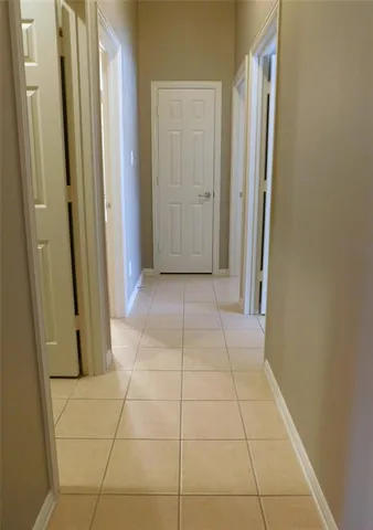 a view of a utility room with windows