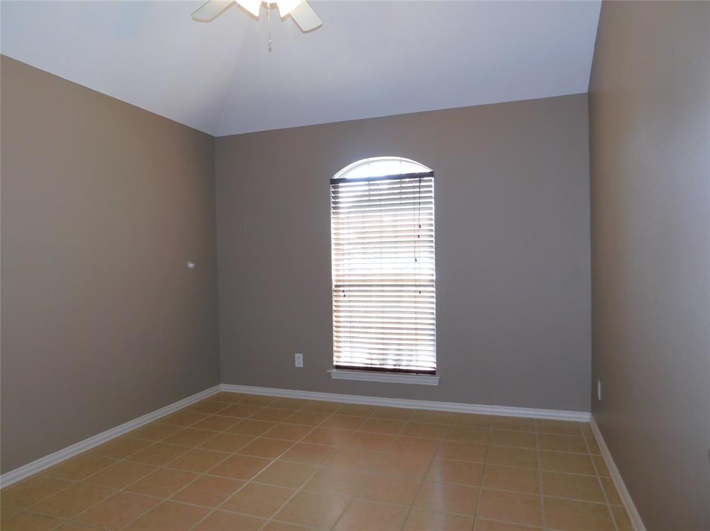 3919 Canton Court Denton, TX 76208 - Photo 21 of 26 an empty room with a window