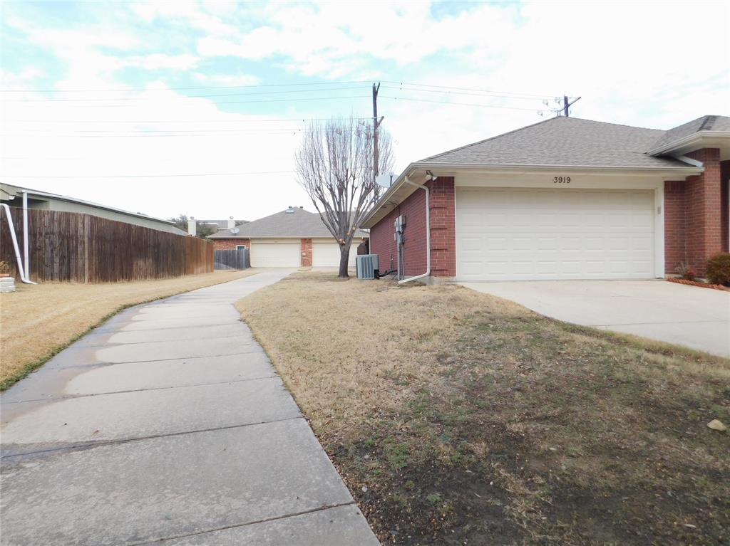 3919 Canton Court Denton, TX 76208 - Photo 4 of 26 a view of a house with a yard