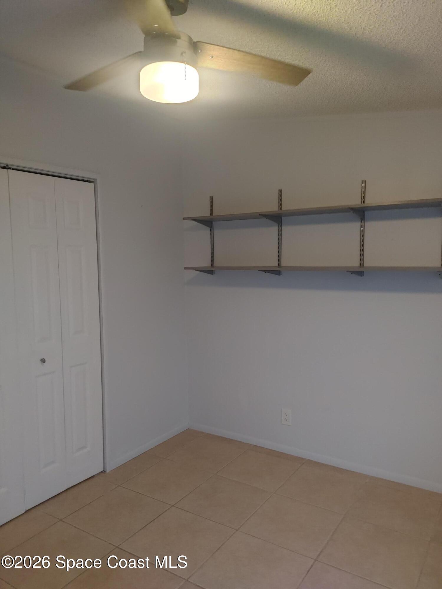 7629 Chasta Road Micco, FL 32976 - Photo 12 of 16 a view of an empty room