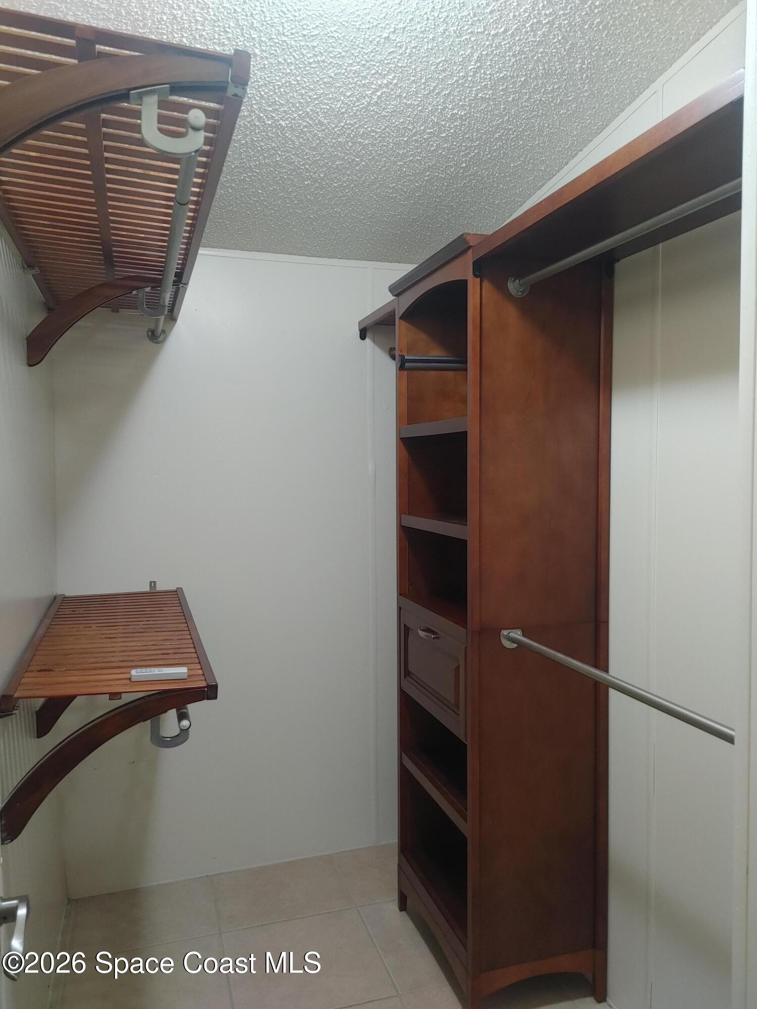 7629 Chasta Road Micco, FL 32976 - Photo 4 of 16 a view of walk in closet