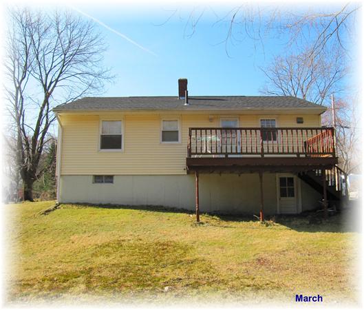 18 Robin Road Westborough, MA 01581 - Photo 12 of 15 a view of a house with a yard