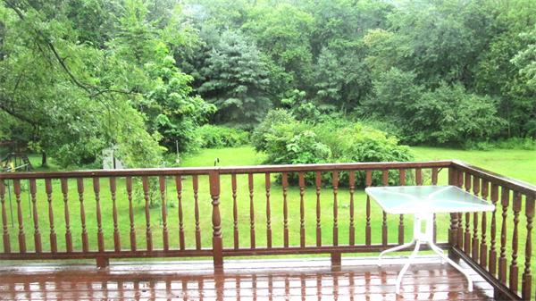 18 Robin Road Westborough, MA 01581 - Photo 14 of 15 a view of balcony with deck and wooden floor