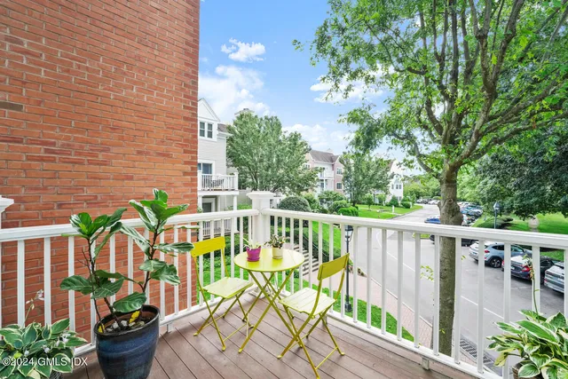 a view of balcony with outdoor seating