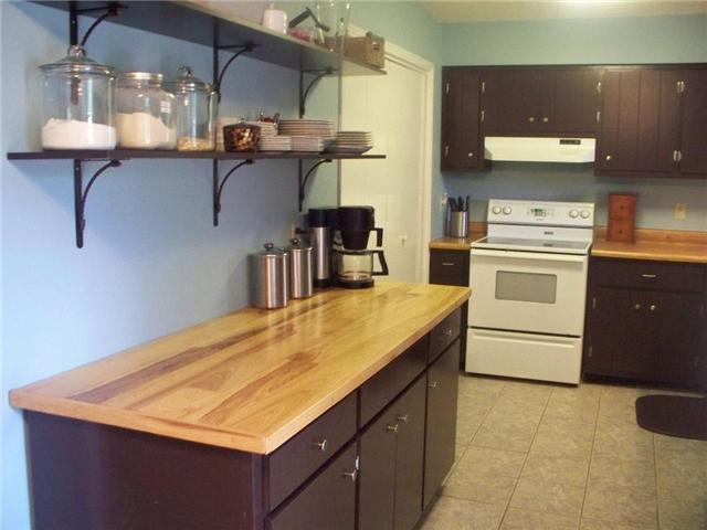 2012 Ridgecrest Circle Dickson, TN 37055 - Photo 7 of 20 One view of the kitchen. Creative shelving and plenty of counter space and counter tops allows for many options and uses