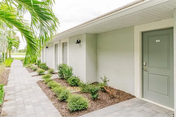 a view of a pathway with a house